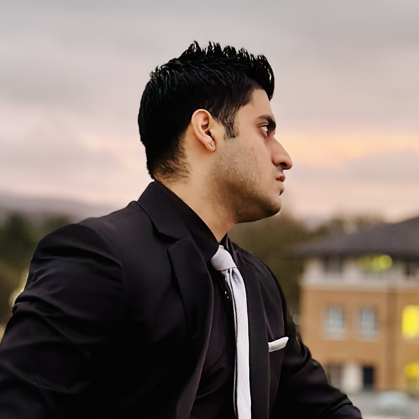 Portrait photograph of: Aman Dhir