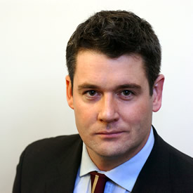 Portrait photograph of: Mark Ritson