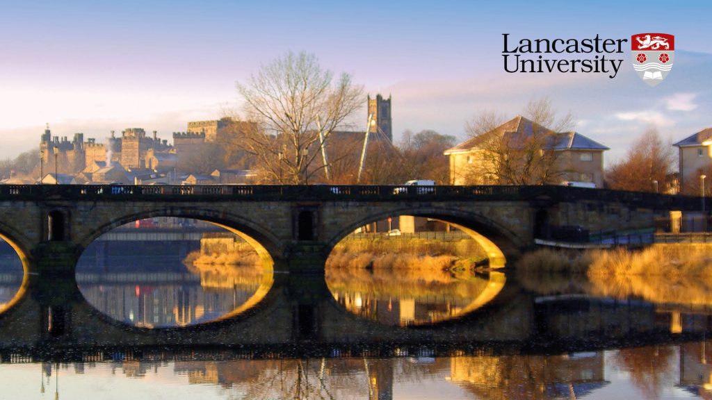 Lancaster university badge superimposed over a photo of the river and bridge close to the city.
