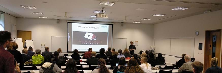 DHUM2018 Photo showing the opening presentation at the Spatial Humanities Conference