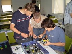 The winning team at work on their robot