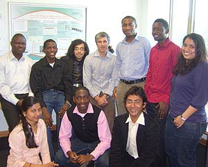 Dr. Phil Benachour (centre) with the students