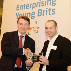 Lord Peter Mandelson presents the award to Antony Chesworth