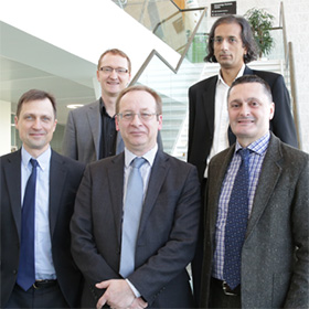 L-R, Back row: Professor Jon Whittle; Professor Awais Rashid. Front: Professor Peter Atkinson; Graham Le Fevre (Raytheon UK); Professor Andrew Atherton