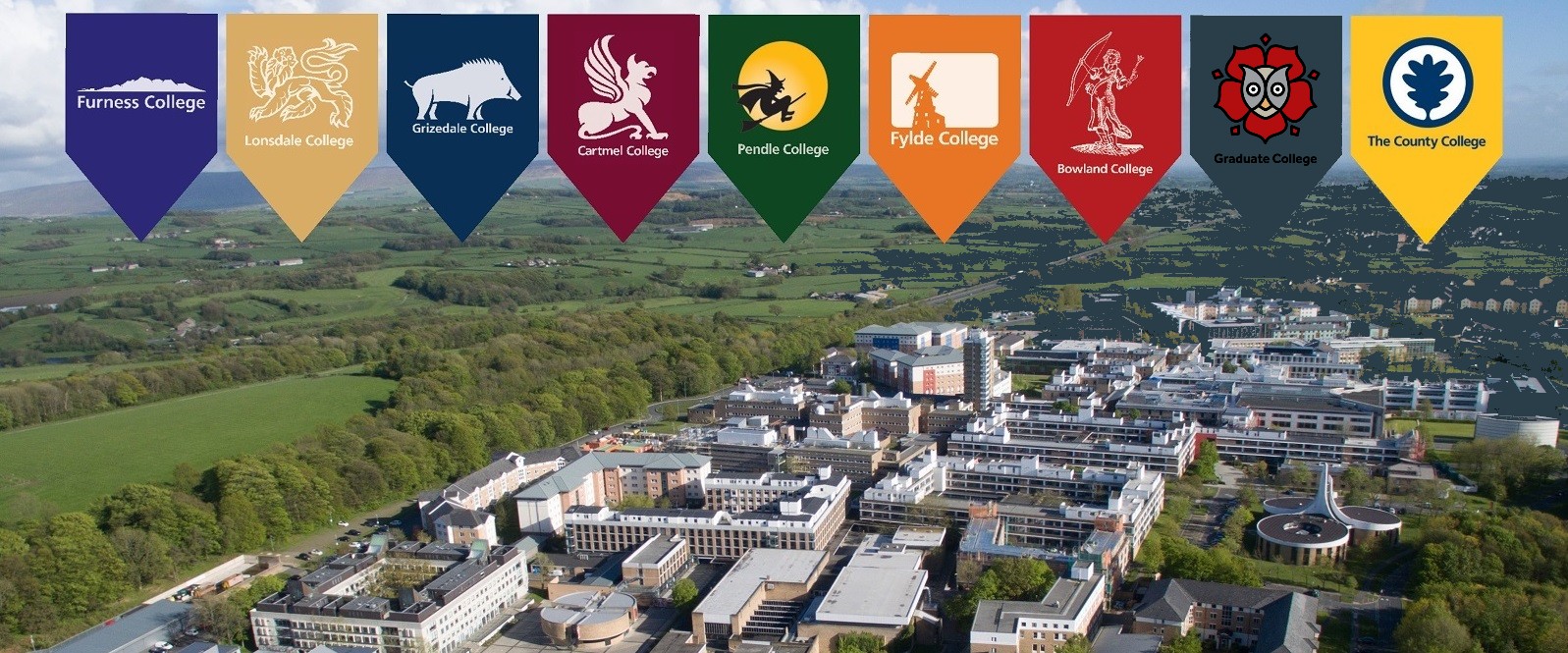Shields of the colleges emplaced over a campus aerial photo.
