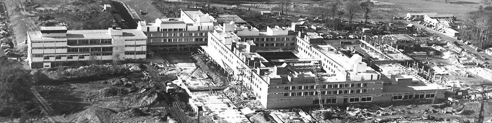 A black and white photograph of Lancaster University under construction