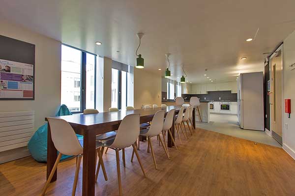 Image of Ash House accommodation kitchen and dining area communal space