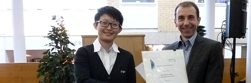 Zhifang Zhang receives certificates and prizes from Professor Steve Young for Best Overall Performance on the MRes programme and Best MRes Dissertation.