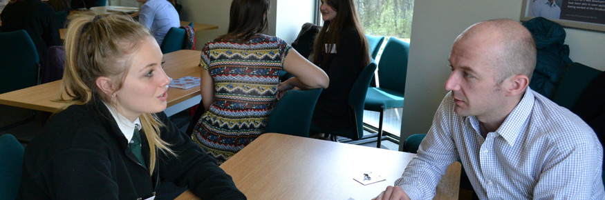 FASS PhD student Oliver Thorne discussing research into RE with Gemma Winter from Queen Elizabeth School in Cumbria.