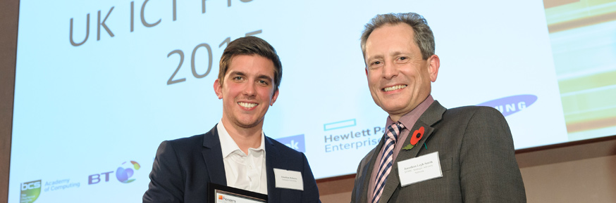 Jonathan Roberts being congratulated by Jonathan Legh-Smith, Head of Strategic Research at BT. 