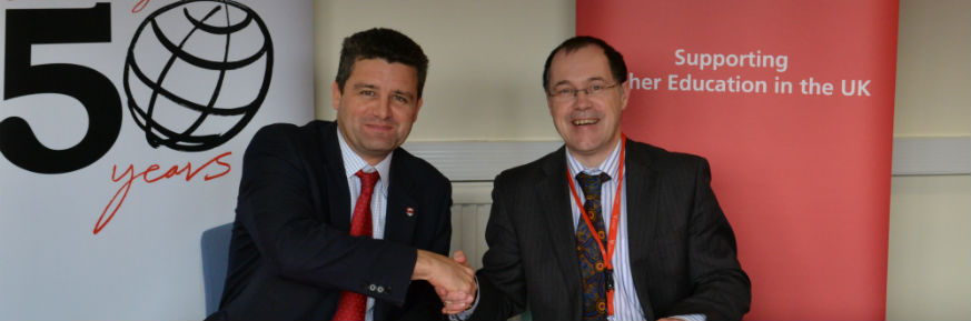 Santander Supports 'Once in a Lifetime Experience' - Vice-Chancellor, Professor Mark E. Smith and Simon Bray, Director of Santander Universities put pen to paper on a renewal of the bank’s philanthropic support for Lancaster students