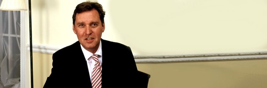 From Council Estate to Cabinet - An Interview with Alan Milburn - Alan Milburn sitting in office