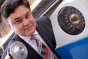 Director of Lancaster University Renewable Energy Group George Aggidis with model turbines