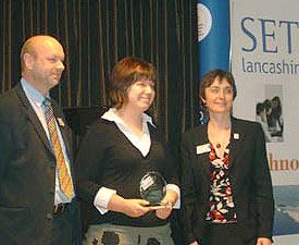Sophie Michel receiving her award from the Director of SETNET North West Kevin Burke and the Manager of SETPOINT Lancashire Barbara Tigar