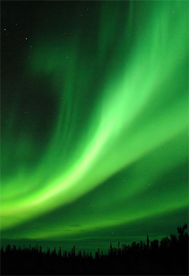 The northern lights: charged particles from the sun interacting with the Earth's atmosphere