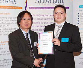 Glen Norris receives his award from Dr Xiandong Ma of Lancaster University