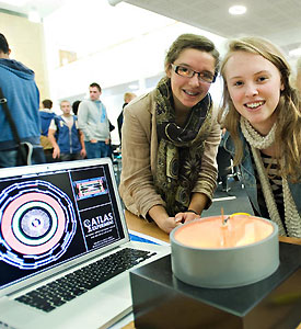 Zoe Harding and Jess Goodfellow with a cloud chamber at the Physics Masterclass