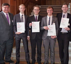 Dr George Aggidis (left), with Lancaster University's four winning engineering students
