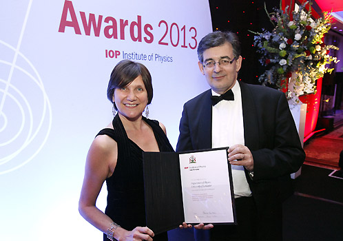Dr Laura Kormos and Head of Physics Professor Peter Ratoff at the IOP award ceremony
