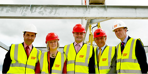 The new engineering building at Lancaster University is 'topped out'. From left to right: Head of the Engineering Department Professor Malcolm Joyce, Faculty of Science and Technology Dean Professor Mary Smyth, Deputy Vice-Chancellor Professor Andrew Atherton, Chairman of Eric Wright Group Eric Wright and Eric Wright Construction Director Jonathan Rayner.