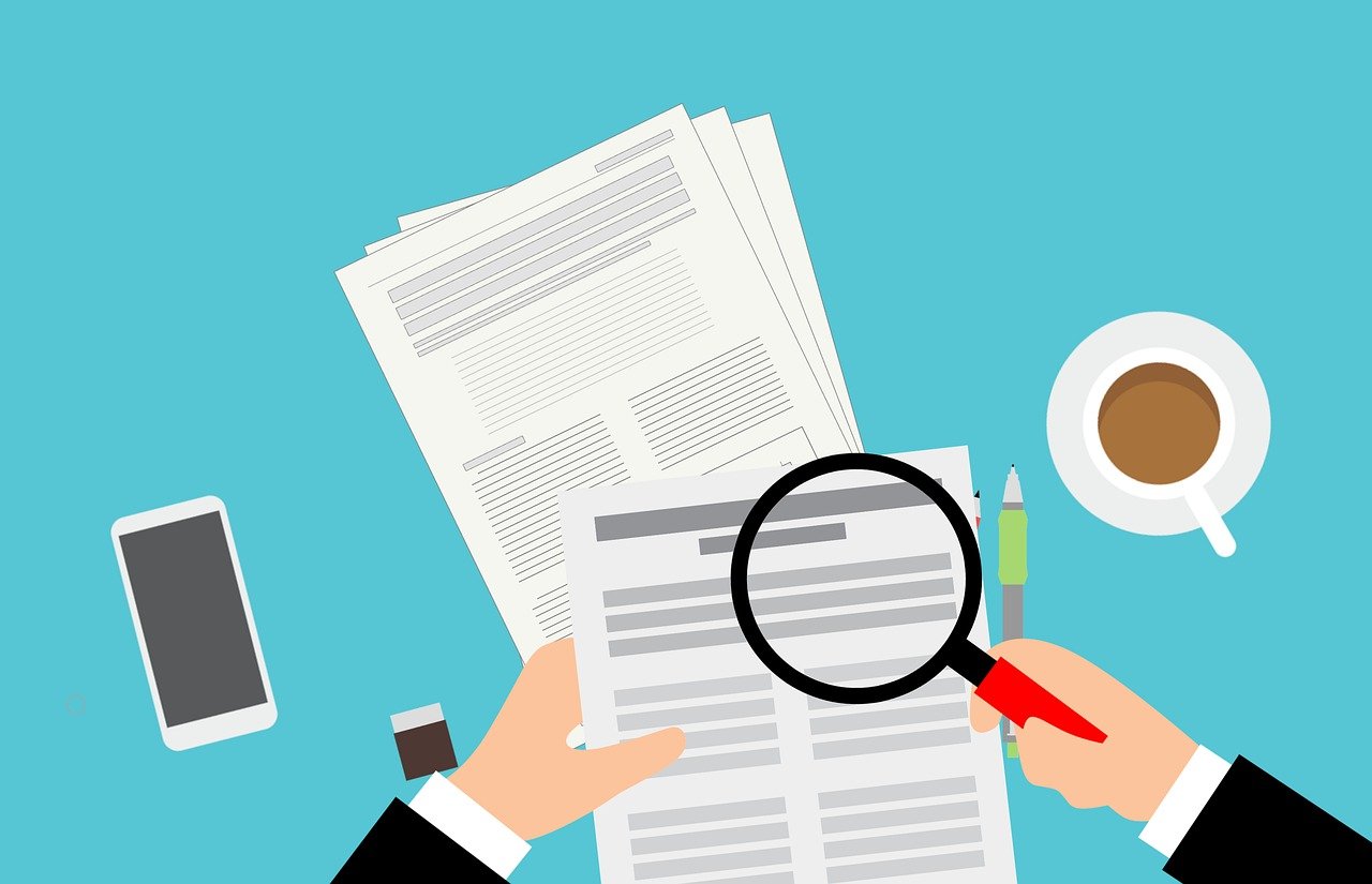 This is an illustration showing the examination of a document using magnifying glass.