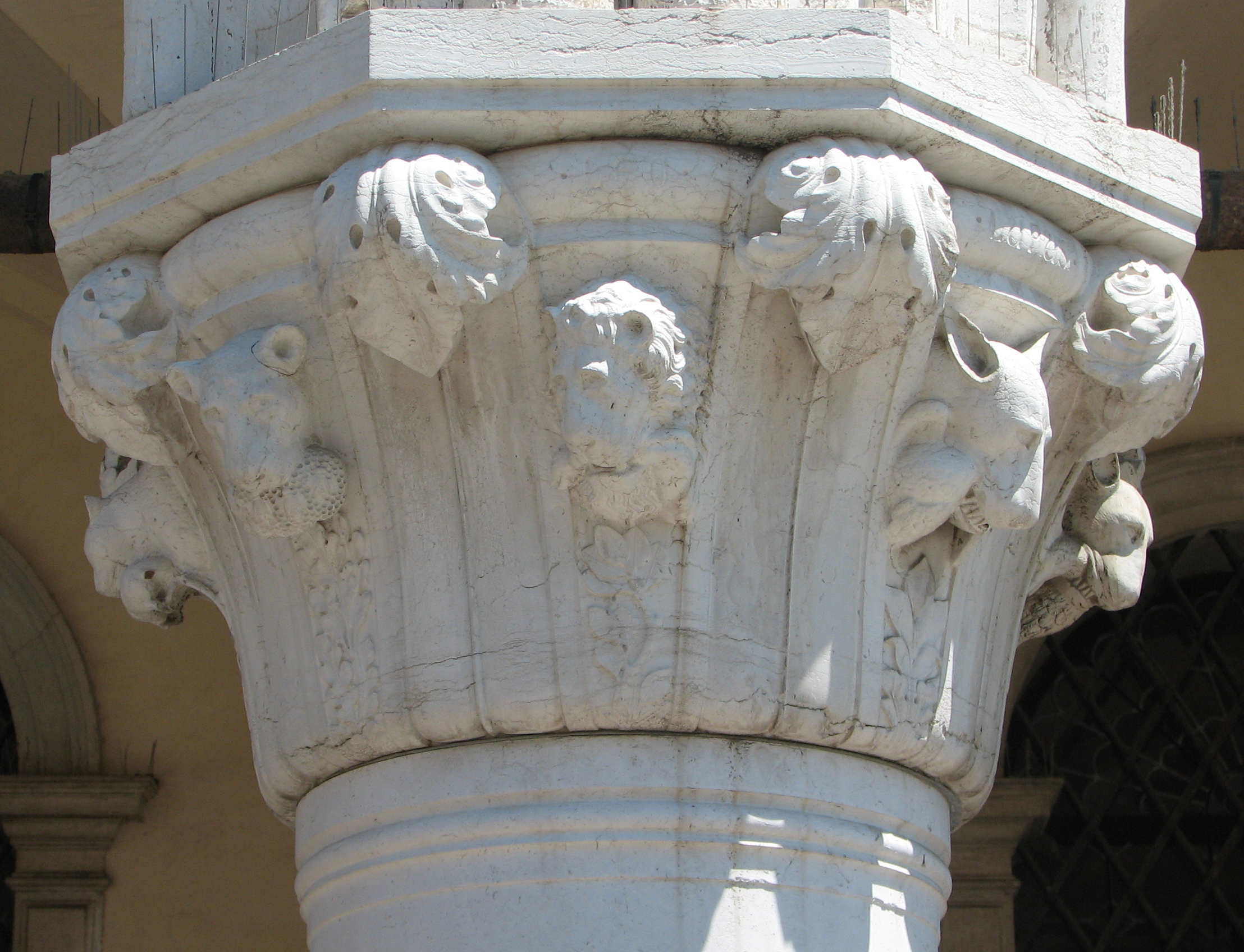 Detail of 1870s copy of 20th capital in its current state Bear with honeycomb and bees, side 8, left; Lion with stags haunch, side 1, centre; Wolf with dead bird, side 2, left