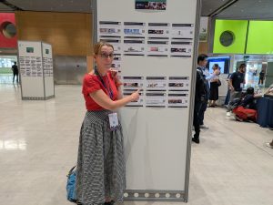 Liz points at her e-poster