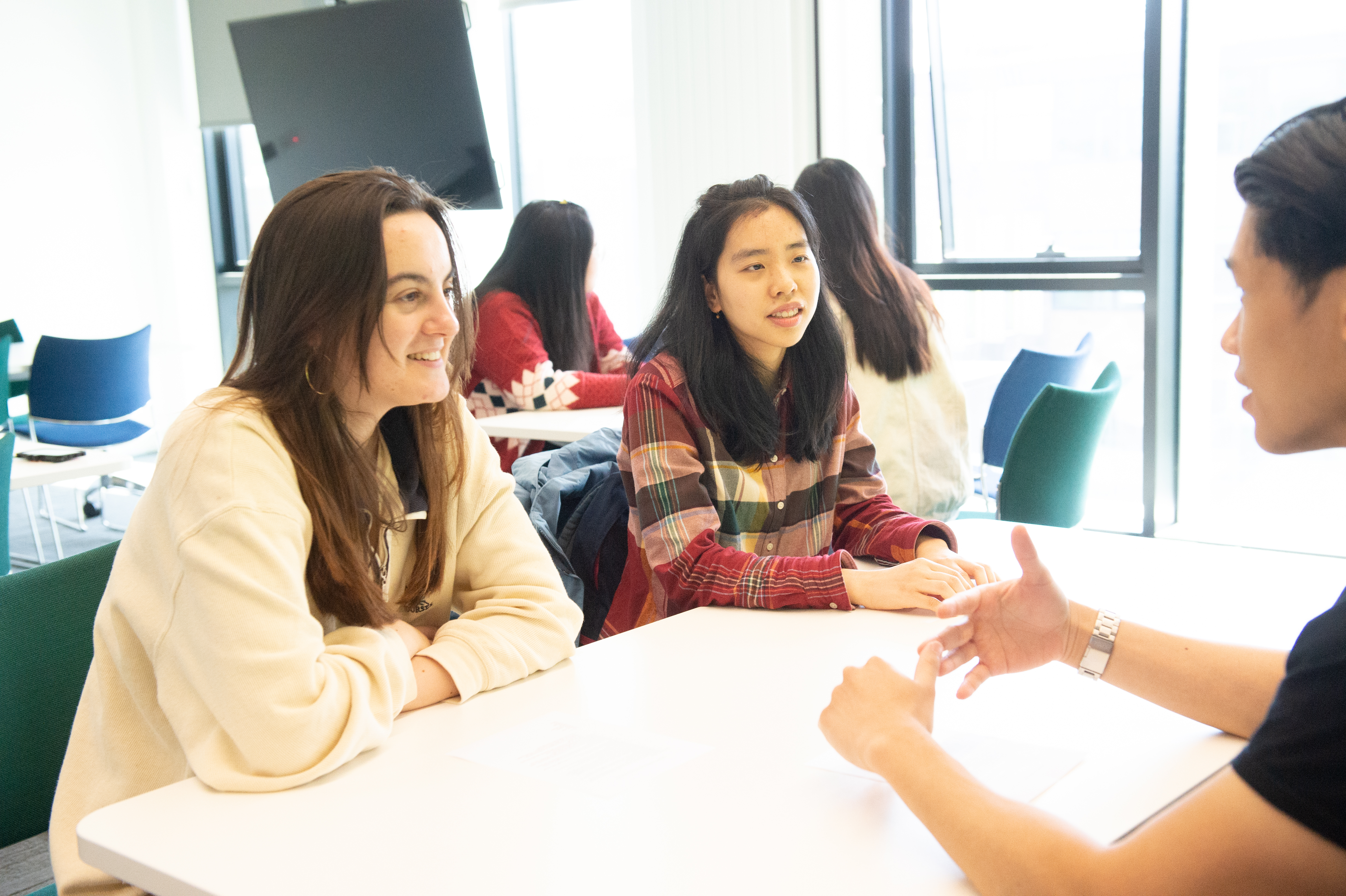 Students working in the library supported learning area