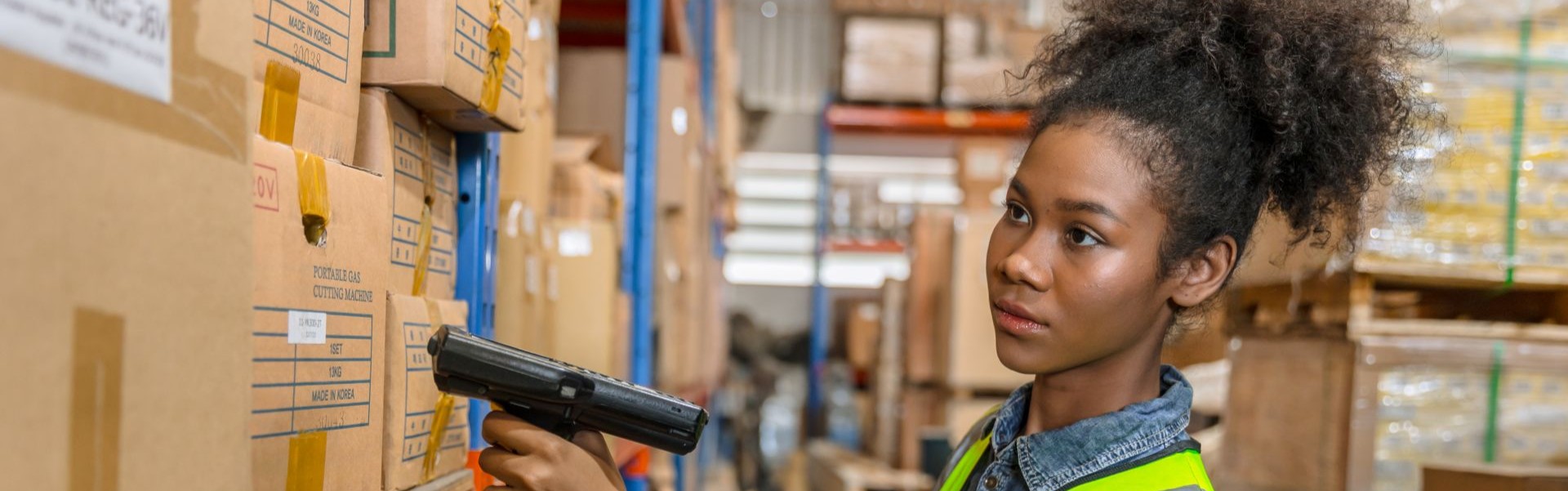 Young black woman working in a warehouse