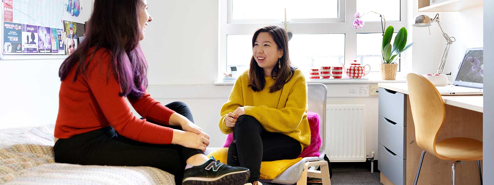 Two students talking in a Campus bedroom