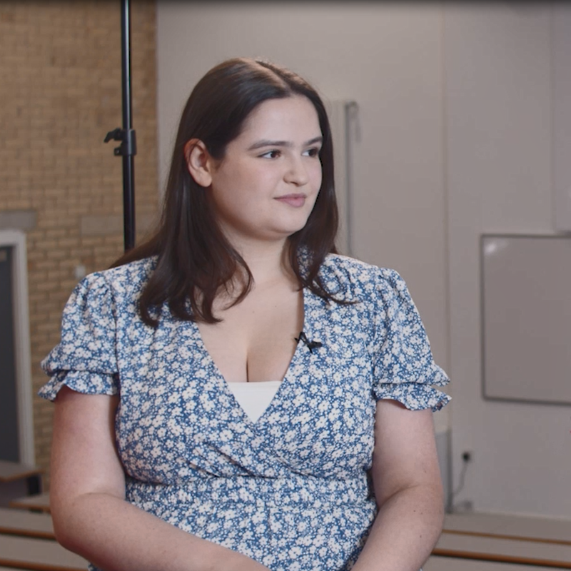 Biochemistry student Rebecca, wearing a blue floral dress