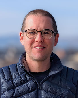 A head and shoulders photograph of Jamie Hodge