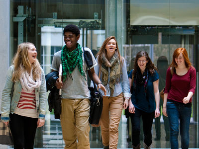 five students walking together