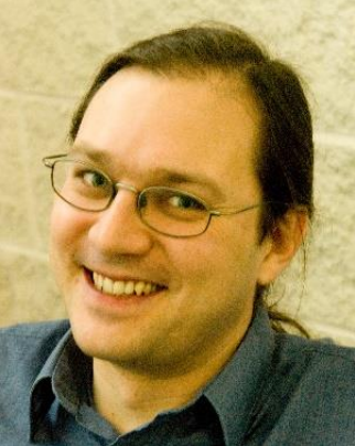 Photo of Professor Joe Finney from Lancaster University, full face and partial shoulders, facing the camera.