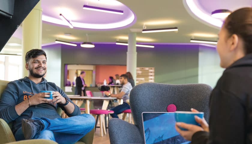 Two people in a cafe
