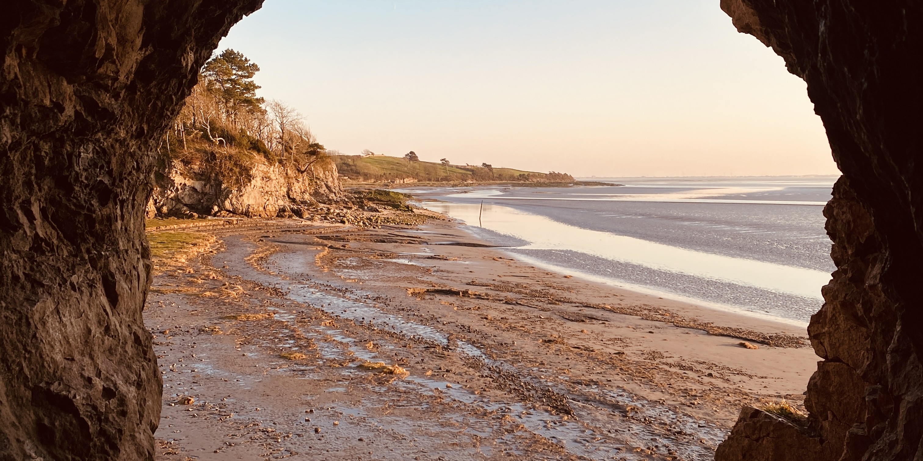 Inside the Silverdale Cove looking at the coast of it with a hint of light orange sunset. 