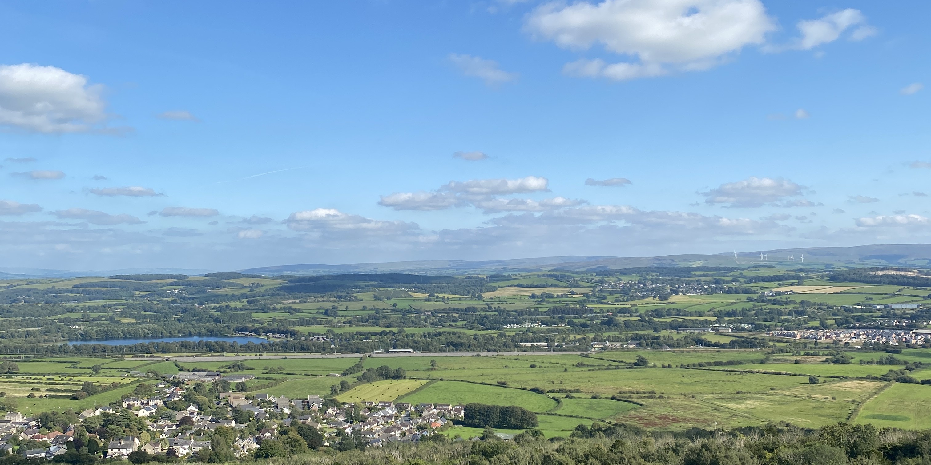 A scenic view of the Morecambe Bay and the countryside from the Warton Crag. 