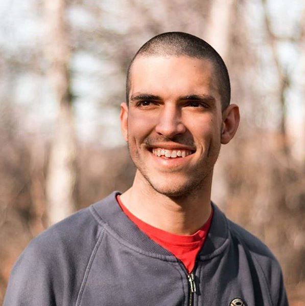A male student smiling