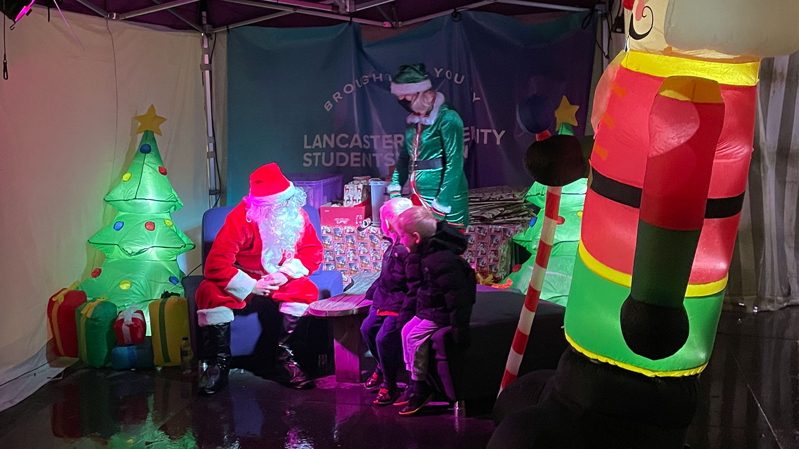 Father Christmas greets children on campus