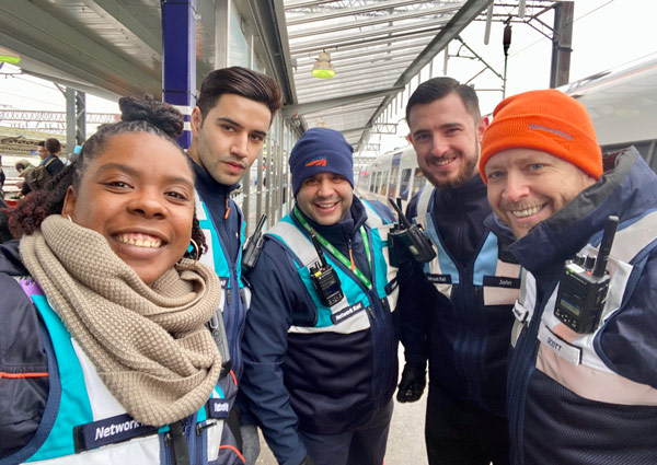 A group of staff on the station platform