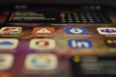 smartphone home-screen showing a variety of apps with the word ‘Calendar’ in focus