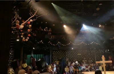 Theatre performance including stage lighting