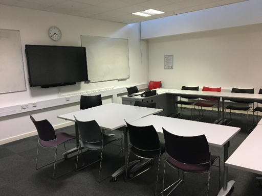 A room with desks and chairs