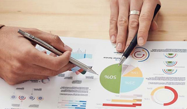 Two hands pointing to a diagram.