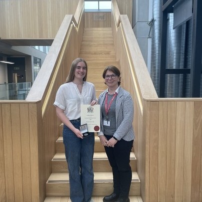 Isobel Glover holds the Armourers and Braziers Prize