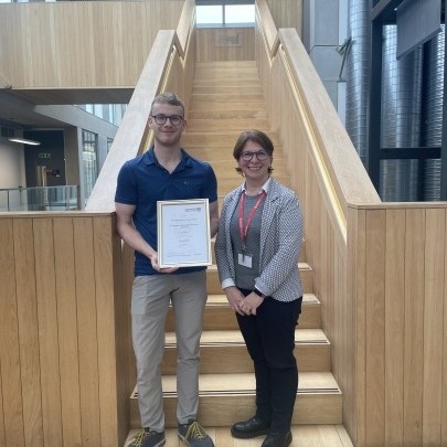 Sam Lavender holds the Michael French Prize