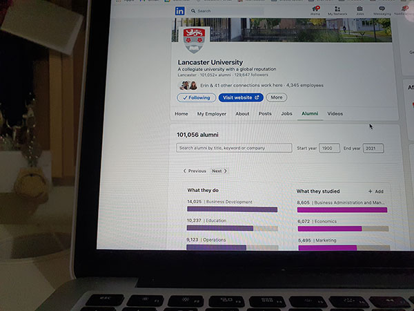 Image of laptop screen showing Lancaster University LinkedIn page