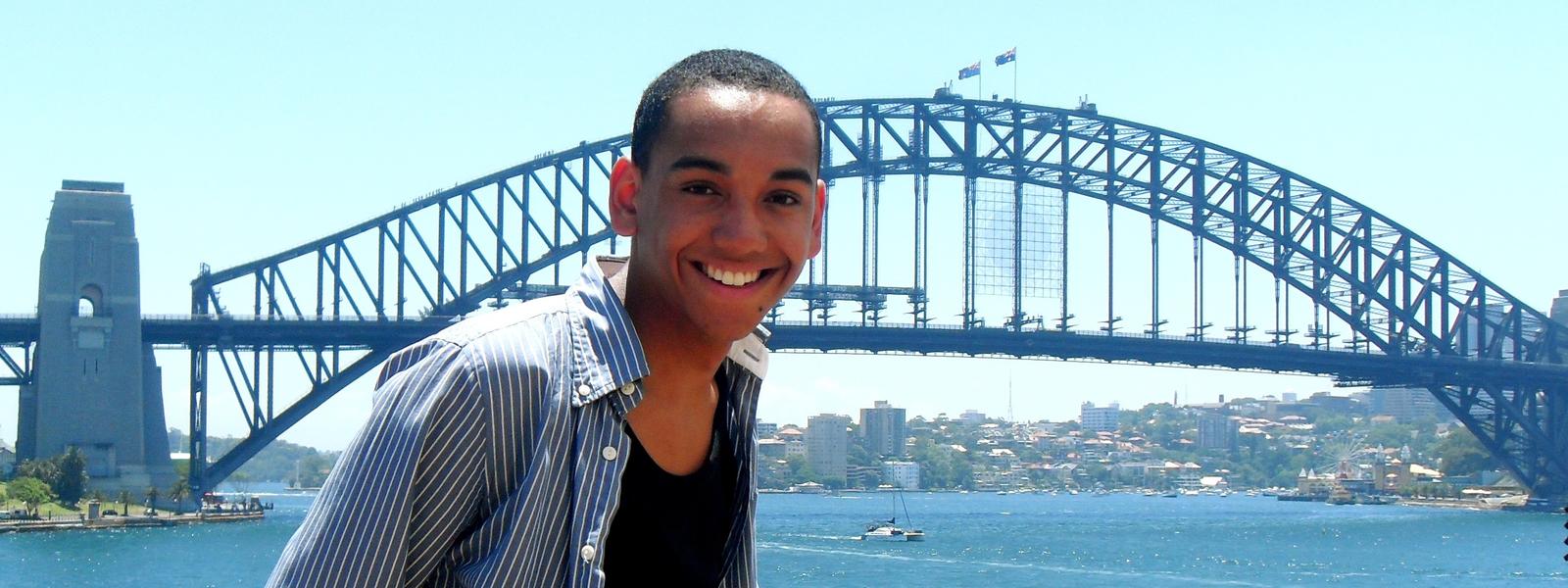 A portrait of a student in front of the golden gate bridge.