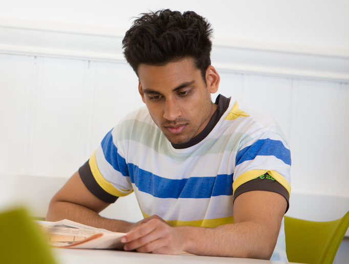 Student reading a book.