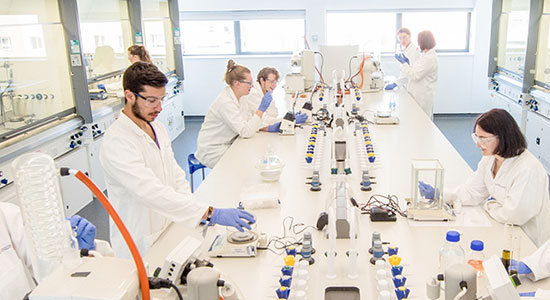 Researchers working in a science lab